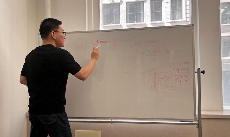 Rebellions CEO Sunghyun Park explaining the company’s memory-centric approach. All About Circuits image.