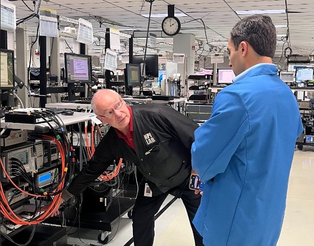 Jeff Schuch and Jake Hertz at the manufacturing floor’s Instrument Test station.