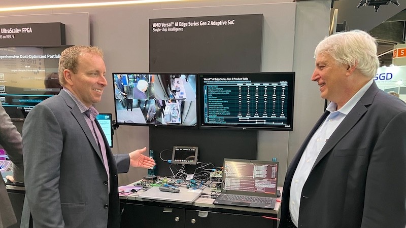 At Embedded World 2025, AMD’s Kirk Saban discusses AI with Jeff Child in front of the company’s AMD Versal AI Edge Series Gen 2 Adaptive SoC demo.