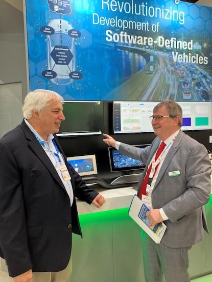 Jeff Child (left) talks with a Green Hills representative 