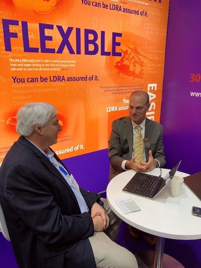 Jeff Child (left) talks with an LDRA representative