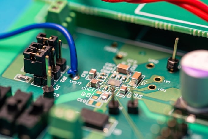 PCB surrounded by capacitors