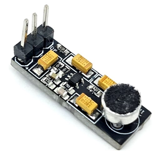 Figure 1. The assembled Microphone Amplifier, 5V Supply module, with the electret microphone capsule and 3-pin header visible.