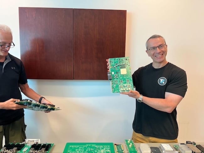 Tim Bieber (left) and Gene Markozen (right) with 7 Series PCBs