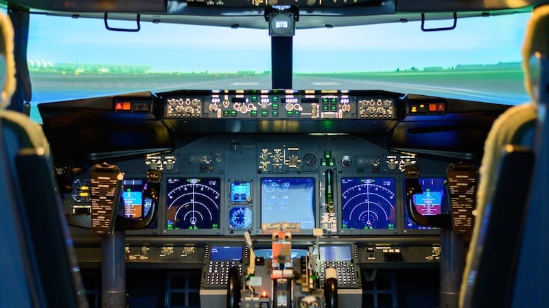 Aircraft cockpit highlighting complex, software-driven avionics systems