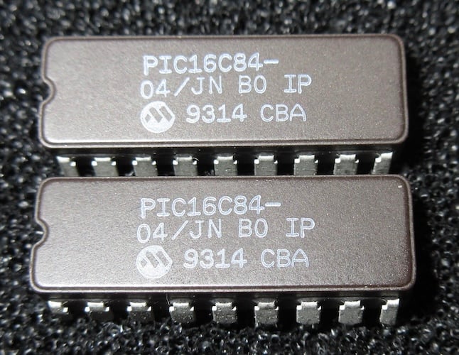 Two Microchip PIC16C84 chips