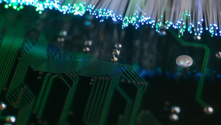 Programming Optical Circuits for Specific Applications and Reducing Production Costs