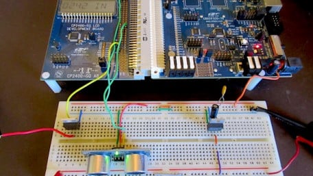 How to Interface an Ultrasonic Sensor with an LCD Using a Microcontroller Dev Kit